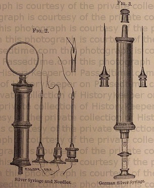 silver syringe and needlesw